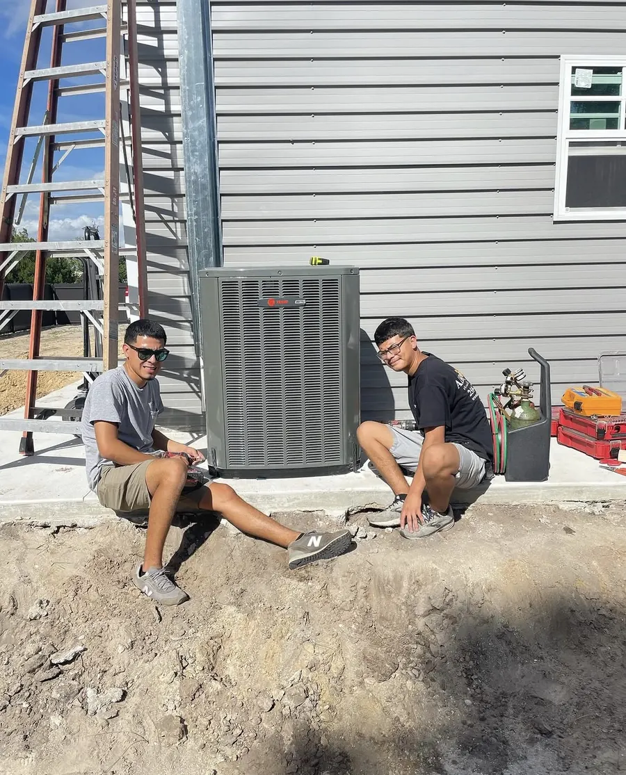 Daniel Jr. and Cristian Puente on a job site